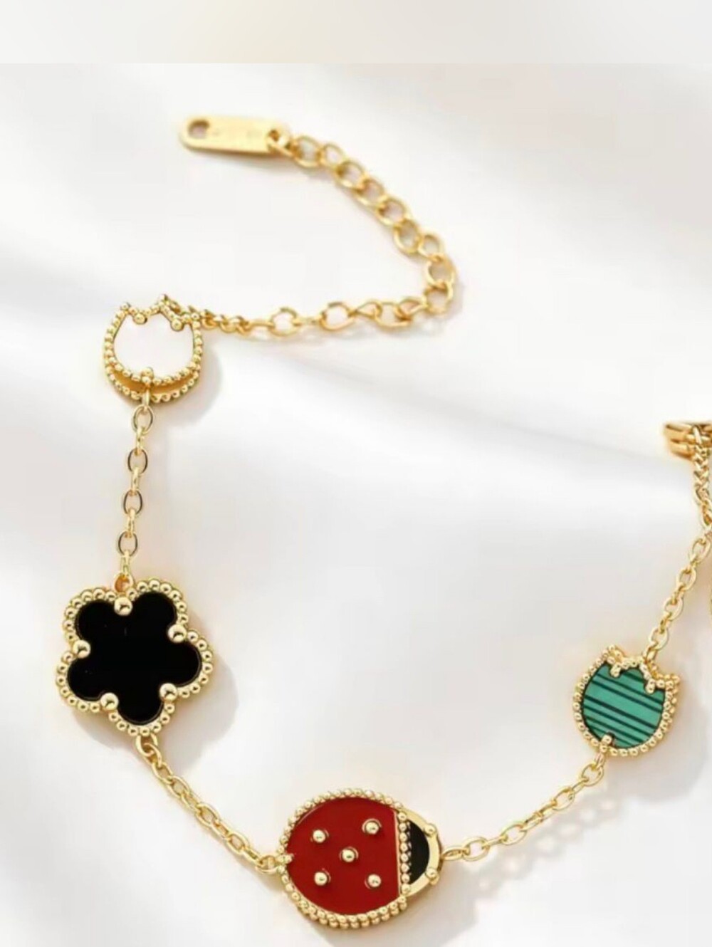 Luxury Gold-Tone Women’s Charm Necklace with Red, Black & Green Enamel Accents - Picture 2 of 4
